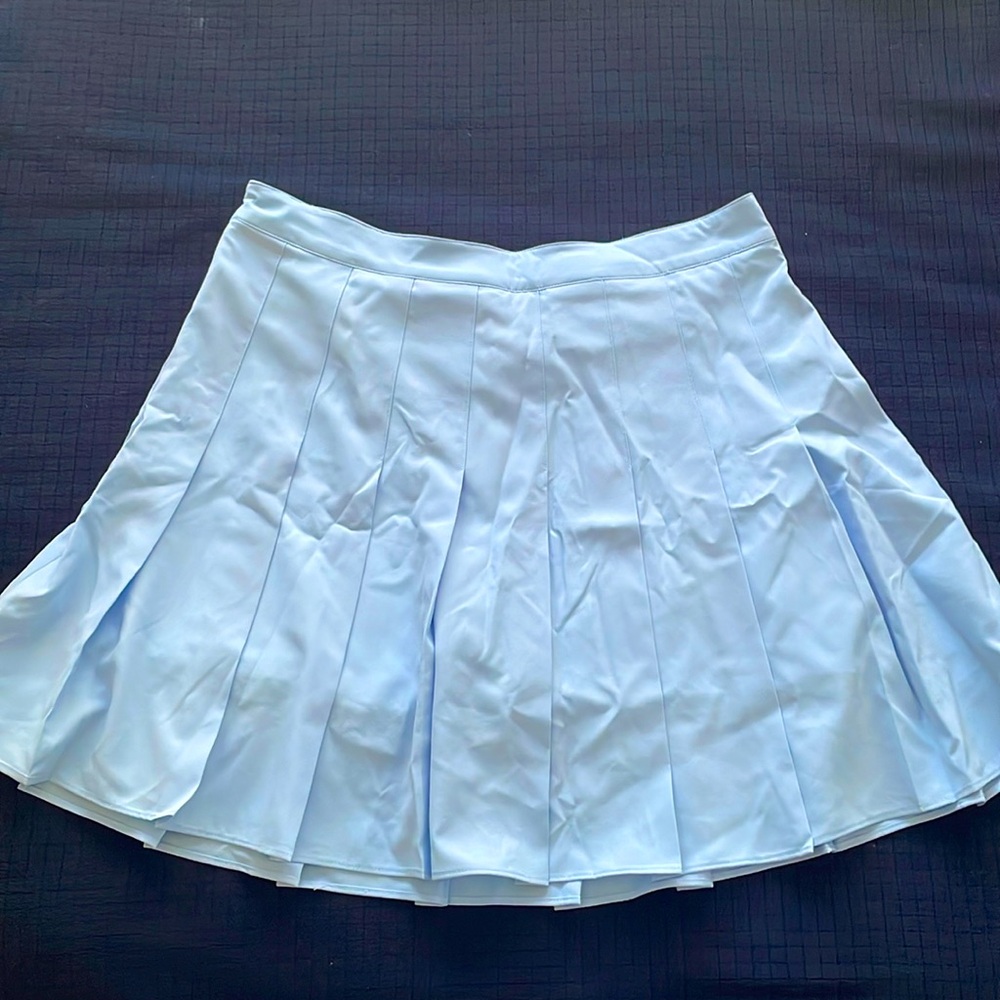 Blue pleated mini skirt.